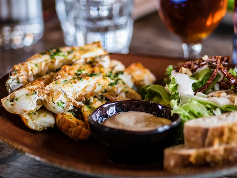 Chef carefully layering vegetables in our signature Biryani Reimagined dish